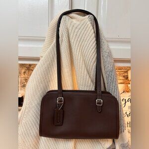 Coach swing zip in color maple